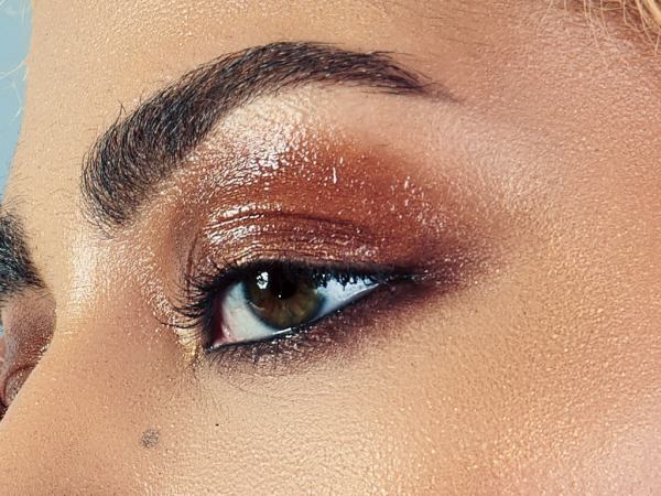 A photograph of a person's eye area with makeup applied