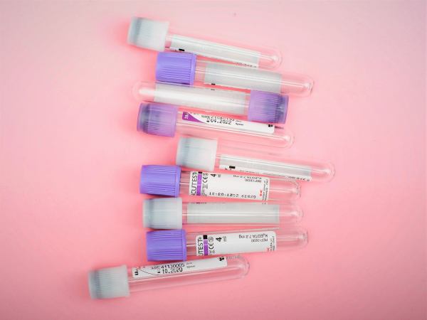A set of empty blood sample tubes