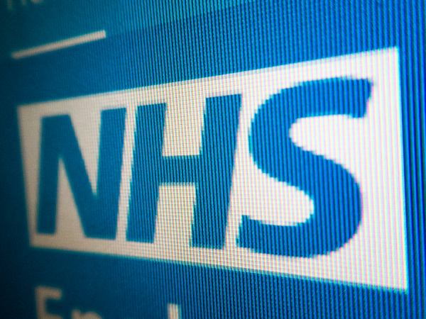 NHS logo closeup on computer screen